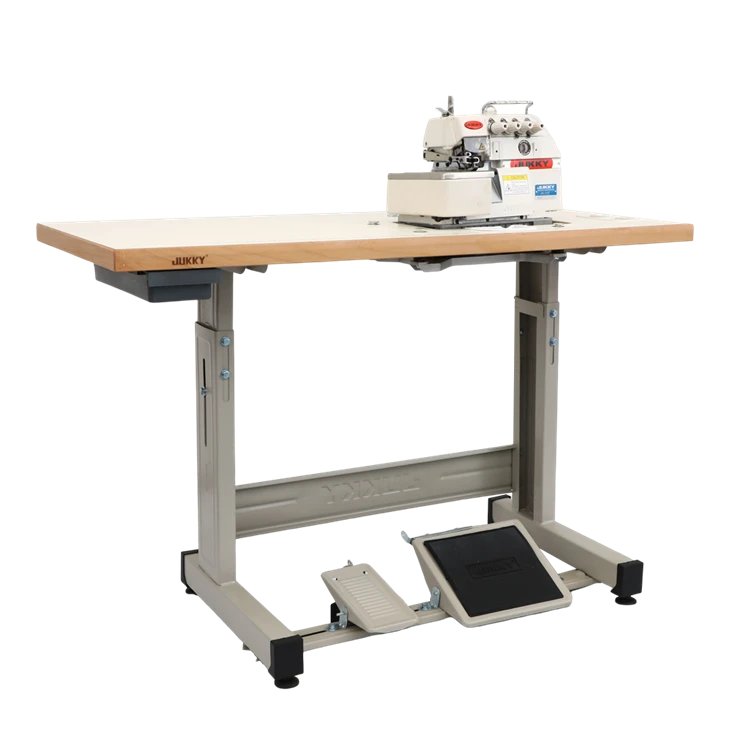 Industriell överlucksmaskin med bord